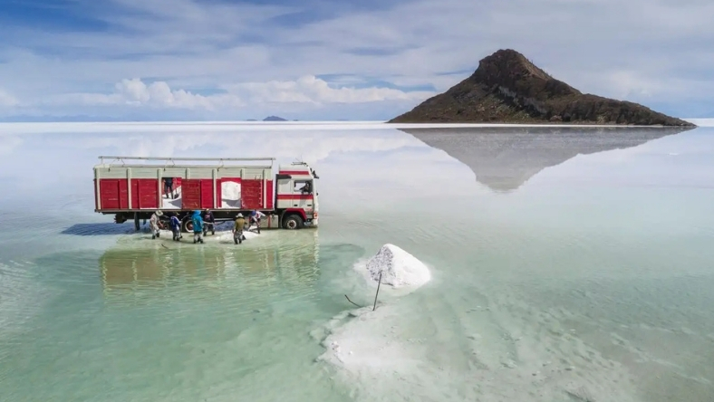 Lithium brine extraction site with truck on salt flats